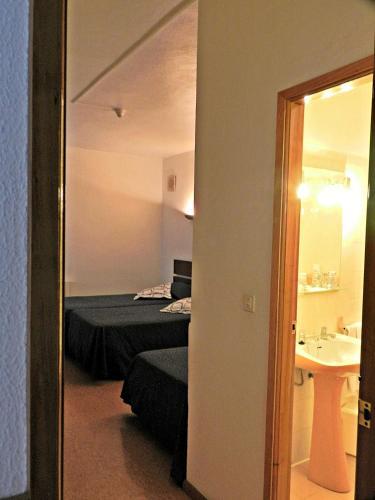 Foto de una habitación de Hotel Val Flores