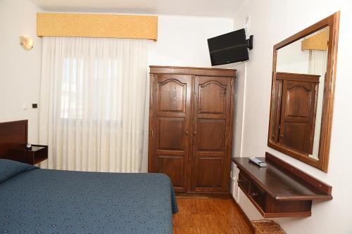 Foto de una habitación de Hotel Val Flores