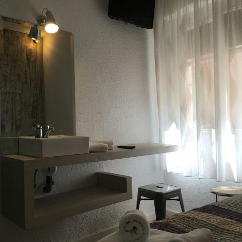 Foto de una habitación de RoomConcept Hostel