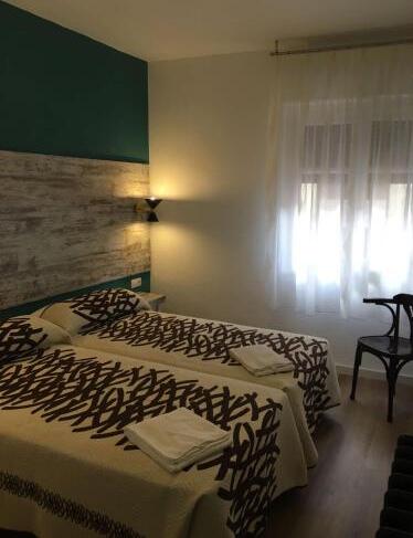 Foto de una habitación de RoomConcept Hostel