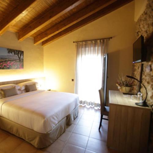 Foto de una habitación de Hotel Can Panyella