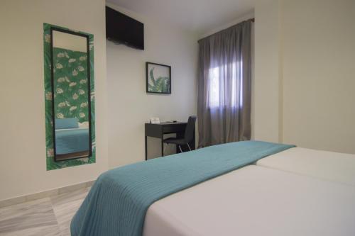 Foto de una habitación de Hotel Isla Menor