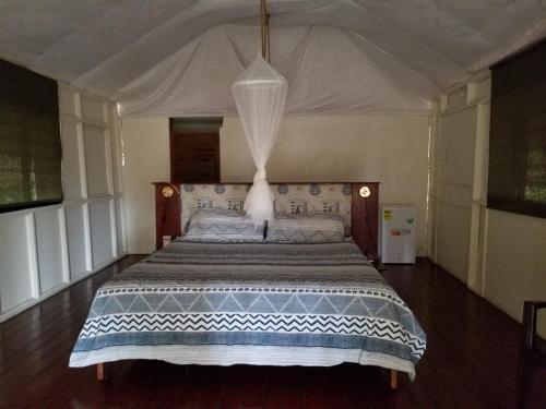 Foto de una habitación de Playa Paraiso en Magante