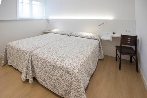Foto de una habitación de Hotel Roma