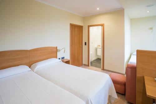 Foto de una habitación de Hotel Roma