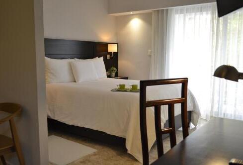 Foto de una habitación de Hotel Plaza Florida Suites