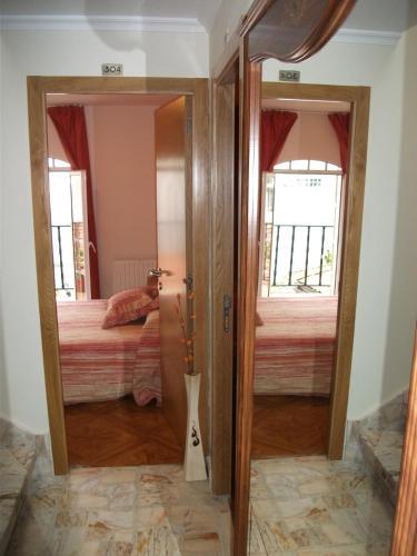 Foto de una habitación de Hostal la Colegiata