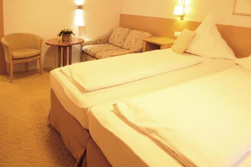 Foto de una habitación de Hotel &amp;amp; Restaurant Bei Baki
