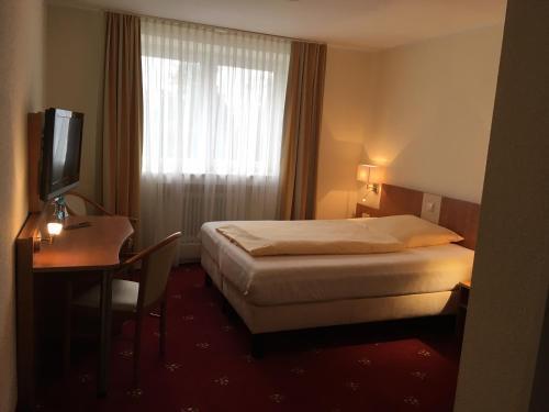 Foto de una habitación de tauwerk Hotel