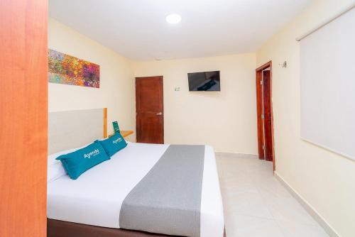 Foto de una habitación de Hotel Baly Express