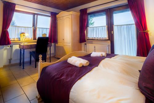 Foto de una habitación de Hotel Garni Zeranka