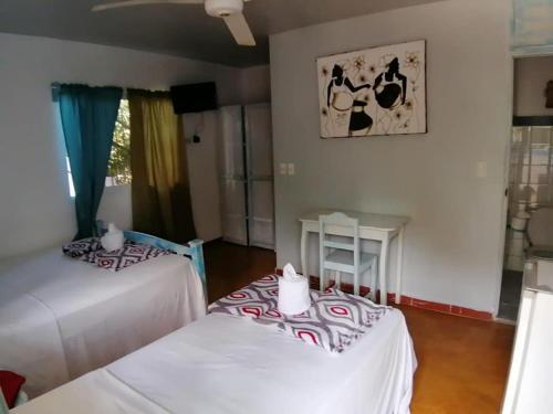 Foto de una habitación de Casa Brisa Mar Hotel