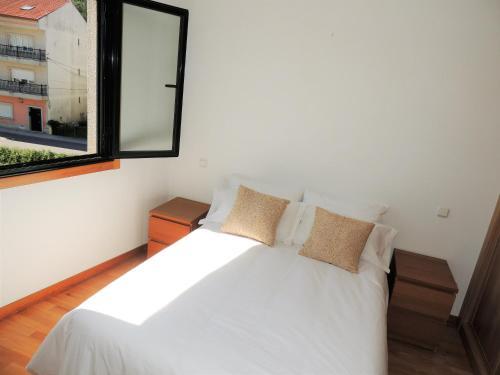 Foto de una habitación de Apartamento cómodo y familiar en Ribeira