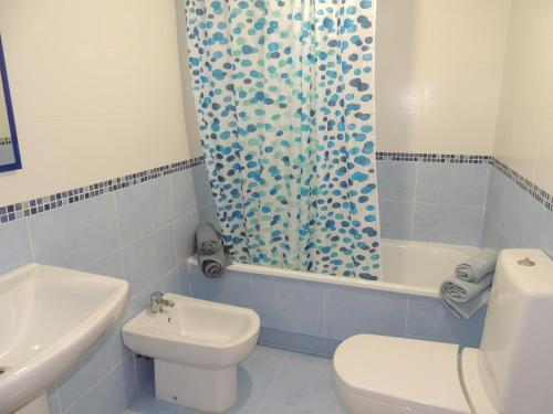 Foto de una habitación de Apartamento cómodo y familiar en Ribeira
