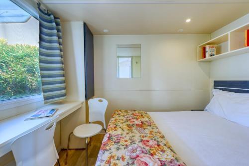Foto de una habitación de San Benedetto Vecchio Mulino Camping Village