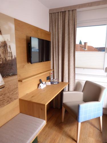 Foto de una habitación de Hotel Landhaus Bolzum