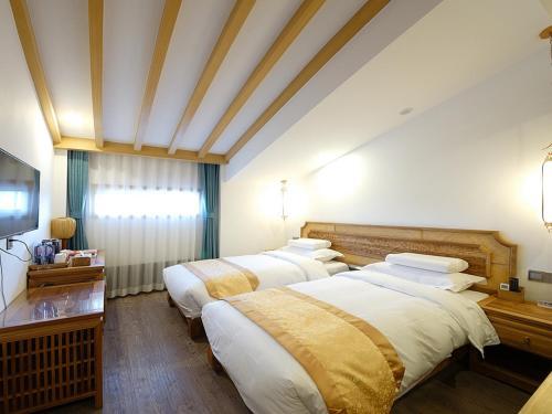 Foto de una habitación de Pipa Hotel Datong