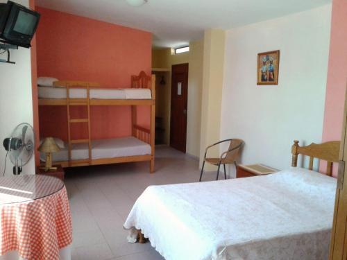 Foto de una habitación de Hotel La Perla