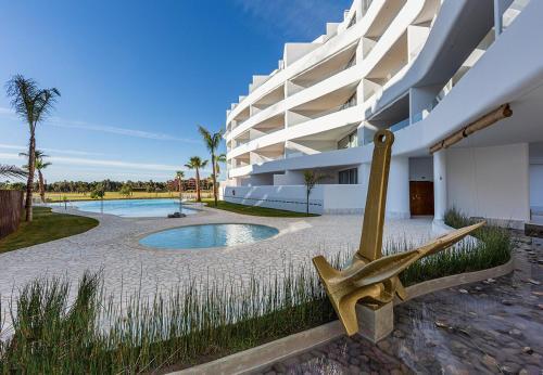 Foto de una habitación de Apartamentos Homity Exclusive Playa Granada Beach &amp;amp; Golf - Mar de Astrid