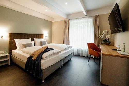 Foto de una habitación de Seehotel am Tankumsee