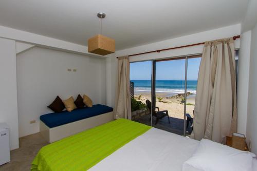 Foto de una habitación de Hoja de Palma Bungalows