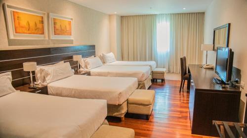 Foto de una habitación de Hotel Orfeo Suites Cordoba