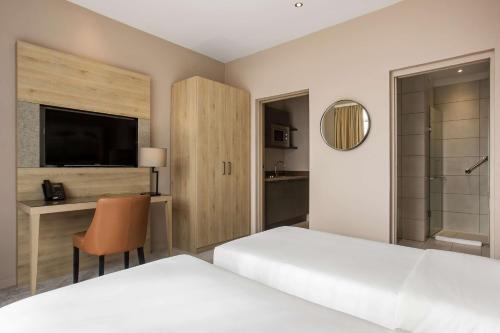 Foto de una habitación de Radisson Serviced Apartments Antananarivo City Centre