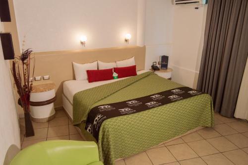 Foto de una habitación de Hotel Puente Nacional &amp;amp; Spa