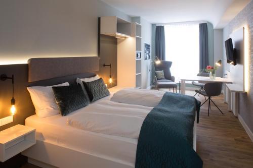 Foto de una habitación de Weberei Bendix Hotel &amp;amp; Appartements