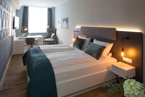 Foto de una habitación de Weberei Bendix Hotel &amp;amp; Appartements