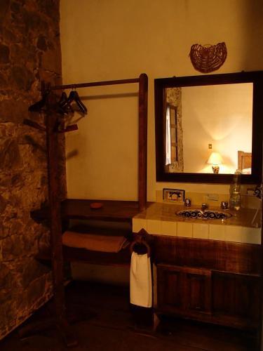 Foto de una habitación de Hotel La Casa de Piedra