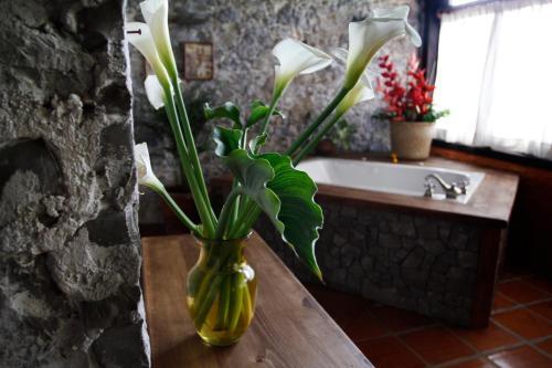Foto de una habitación de Hotel La Casa de Piedra