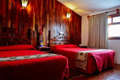 Foto de una habitación de Hotel Meson Yohualichan