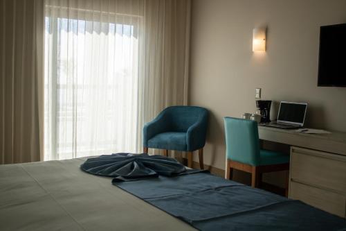 Foto de una habitación de Varali Grand Hotel
