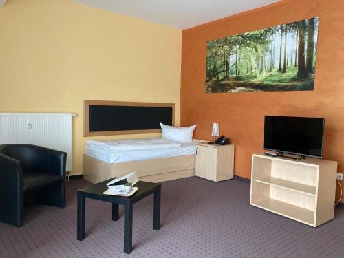 Foto de una habitación de Hotel Am Heidepark