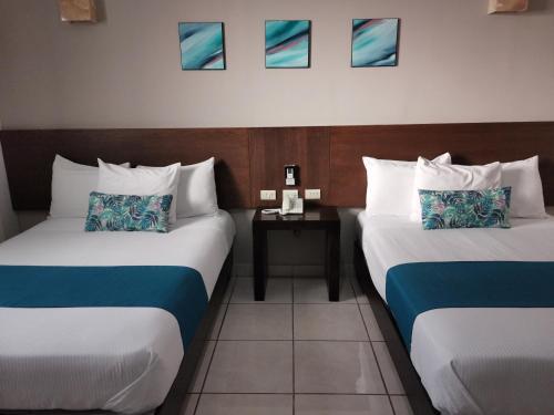 Foto de una habitación de Hotel Pabela