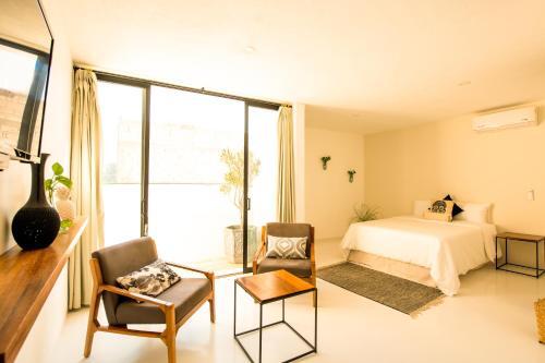 Foto de una habitación de Avela Boutique Hotel