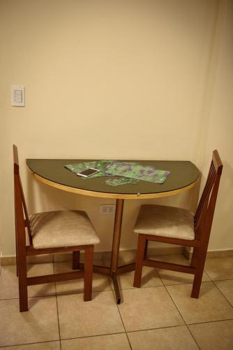 Foto de una habitación de AVEMAR Apart Hotel
