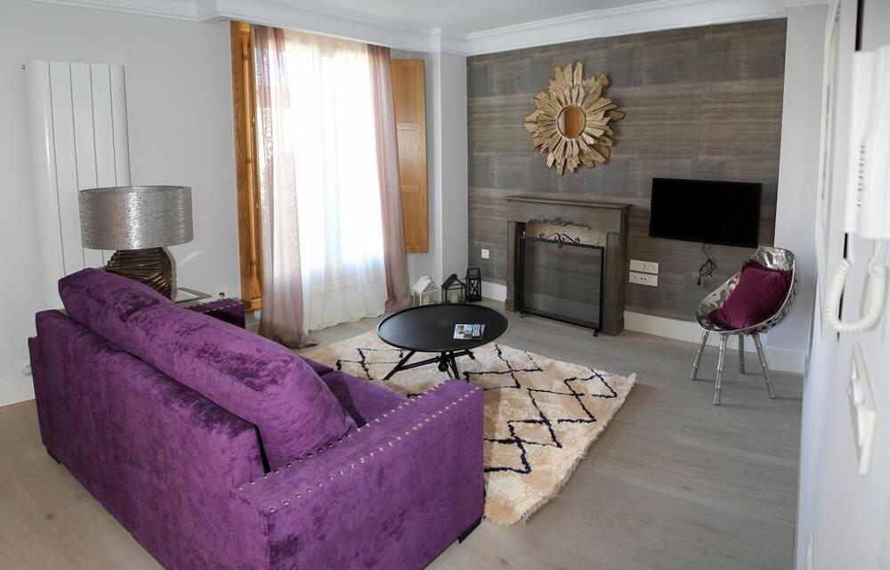 Foto de una habitación de Apartamentos Principia Suites