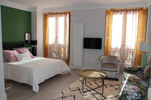 Foto de una habitación de Apartamentos Principia Suites