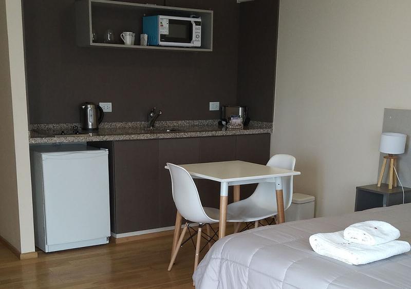 Foto de una habitación de Quijote Apart Hotel