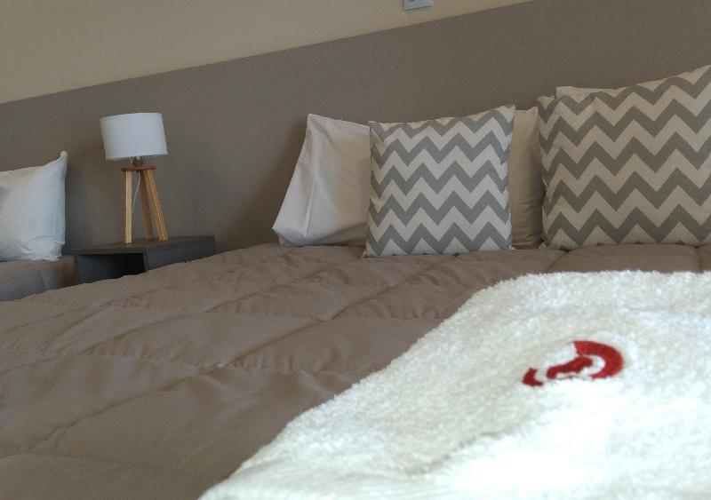 Foto de una habitación de Quijote Apart Hotel