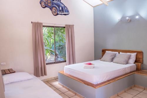 Foto de una habitación de Zula Inn Aparthotel