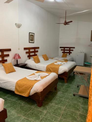 Foto de una habitación de Hotel Don Robert