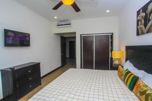 Foto de una habitación de Aparthotel The Palms Ocean Club Resort
