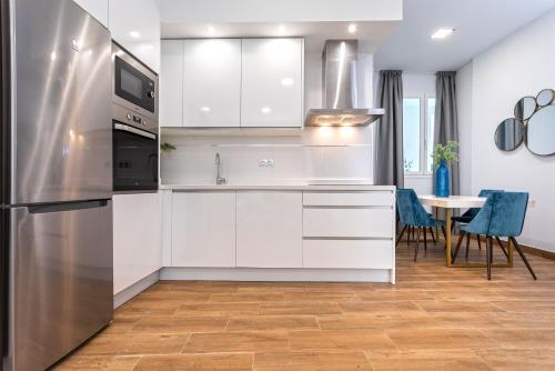 Foto de una habitación de Apartamentos Genteel Home Recaredo