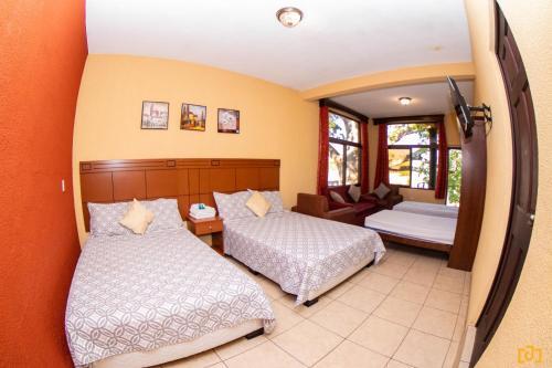 Room – Grand Caporal Hotel