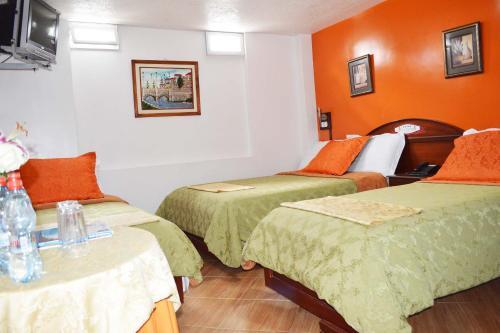 Foto de una habitación de Hotel Plaza Victoria