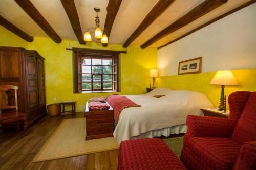 Foto de una habitación de Hotel Hacienda San Agustin de Callo