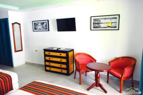 Foto de una habitación de Arenas Beach Hotel